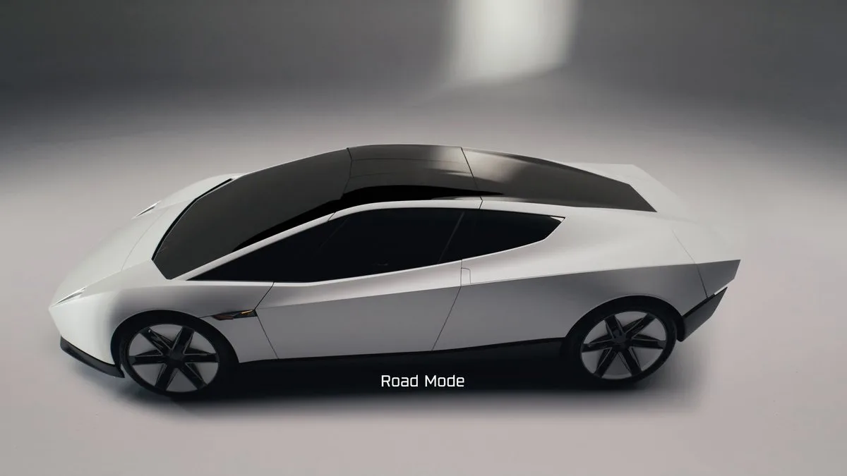 Silver Tesla Roadster shown from above and to the side in Tesla’s official Road Mode video cover.